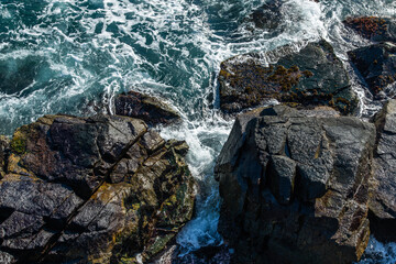 high angle view of the rocks and sea water at the beach