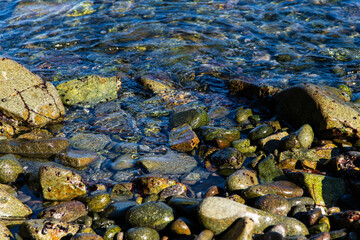 high angle view of the rocks and sea water at the beach