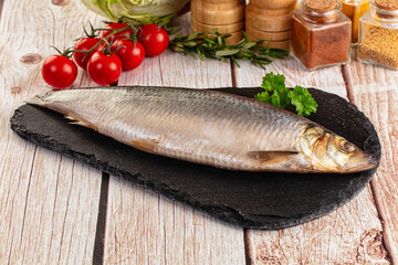 Raw whole salted herring fish