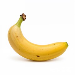 Isolated yellow banana with natural spots used for fruit collections, potassium-rich nutrition themes, and vegan meals