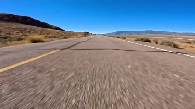 Open Road Adventure A Desert Highway Journey Under a Clear Blue Sky, Endless Horizons and Freedom on the Asphalt