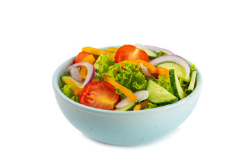 Cucumber salad isolated on white background. Homemade salad with fresh vegetables, cucumber,...