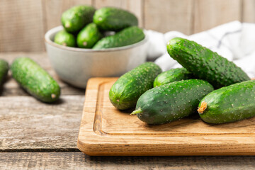 Cucumber on wooden background. Slice of cucumber on background. Fresh organic green cucumbers...