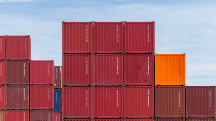 Cargo container stack pile on blue sky background, Global business logistic import export cargo...