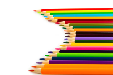 Colored pencils isolated on white background. Equipment for coloring. Stationery for...
