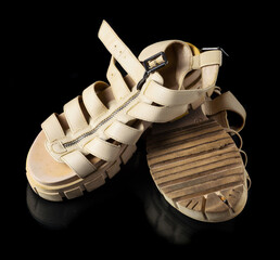 Preowned white leather platform sandals with straps and zip on black background