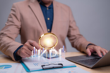 Data Driven Analysis Person Using Magnifying Glass KPI Chart ROI Projection, Wooden Desk Laptop, Key Insights Business Strategy