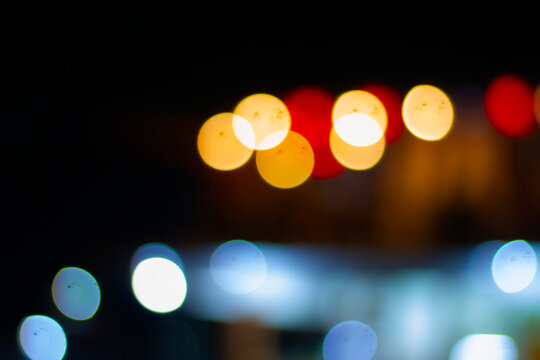 Artistic out-of-focus light patterns suitable for modern backgrounds or design elements.