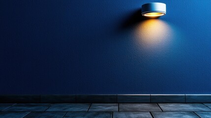 Minimalist blue wall with a modern light fixture showcasing ambient glow