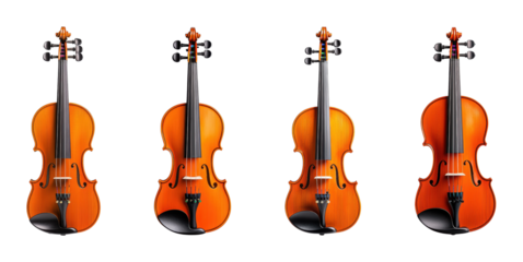 Collection of Four Elegant Violins Isolated on Black Background