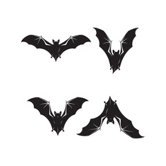 Four Black Bat Silhouettes on White Background bats