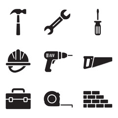 Fototapeta premium Construction and renovation tools including a hammer, drill, hard hat, and toolbox