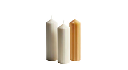 Three tall candles of varying textures and colors on a white background