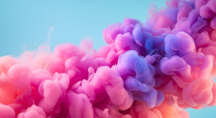 Obraz premium Abstract vibrant pink and purple ink swirling in water, creating a dreamy and colorful background perfect for design projects and artistic expression.