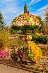 Turtles made of chrysanthemums in a park at autumn