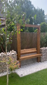 modern bench in city garden