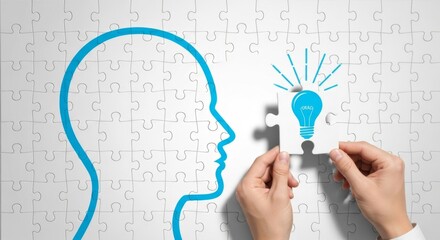 Hands are fitting a lightbulb puzzle piece into a head shape, symbolizing ideas and solutions