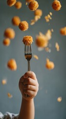 Hand holding fork with flying crunchy cheese balls captured mid-air in dramatic motion perfect for dynamic food advertising, snack branding and kids menu campaign visuals