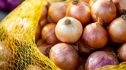 Vibrant Fresh Onions Displayed In A Yellow Plastic Net On A Rustic Background