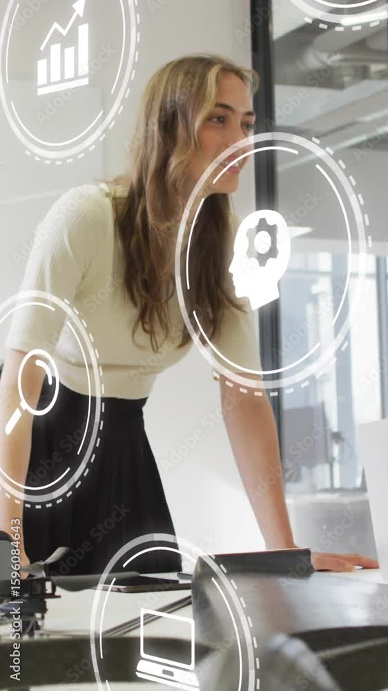 Poster animation of multiple digital icons against team of diverse colleagues discussing together at office
