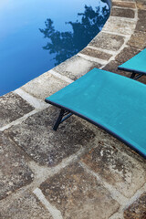 Stone coping at the edge of the pool