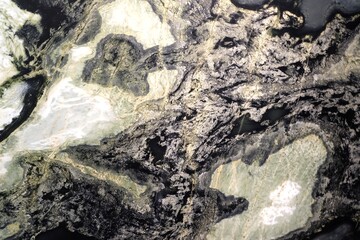 Elegant black polished marble, quartzite, and natural stone are ideal for countertops, kitchen sinks, flooring, and cladding,  for both interior and exterior architectural and design applications