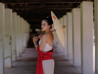 A tourist woman travels to a temple, Northern Thailand. Wat Ton Kwen at Chiang Mai Thailand.