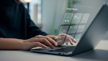 Person typing on laptop with holographic interface hands