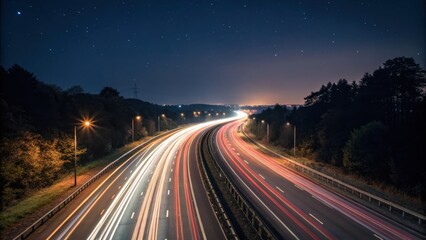 Nighttime Highway with Light Trails Under Starry Sky in Beautiful Landscape