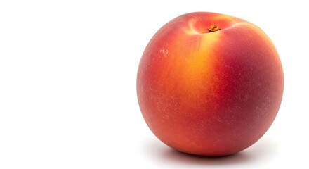 A single ripe nectarine with vibrant red and yellow skin isolated on a white background
