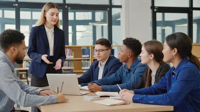 University professor leading a class discussion with a diverse group of students in the library, fostering collaborative learning and academic engagement