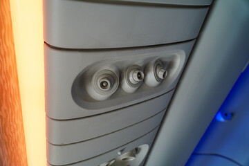 Airplan Focused overhead console with adjustable vents in an interior setting. Features include...