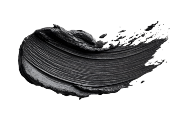 Abstract textured charcoal smear on a black backdrop for creative design concepts