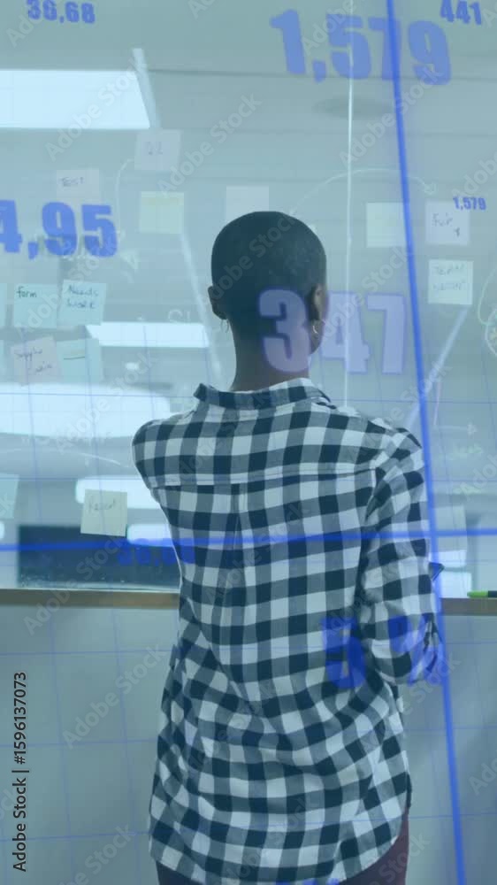 Poster analyzing data charts, diverse team collaborating in modern office with animation
