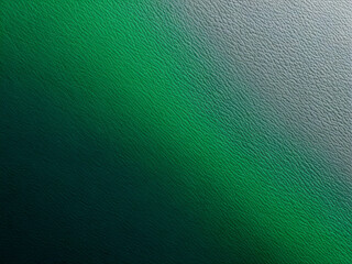 A gradient of green hues on a textured surface, perfect as a background.
