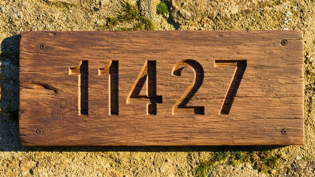 Elegant Wooden House Number Sign Clearly Displayed Address for Visitors and Deliveries