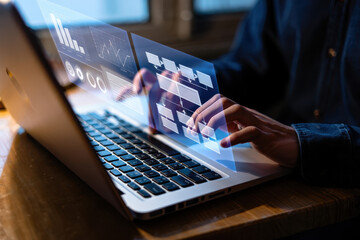 Person using laptop with digital overlay of charts and graphs for data analysis and presentation