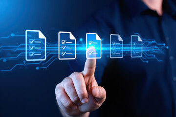 A finger pointing at a digital document with checkmarks on a blue tech background interface screen