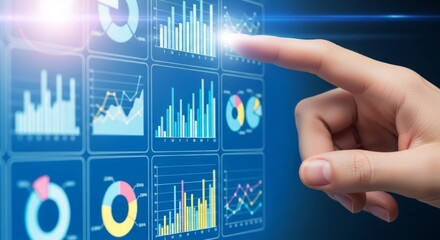 A finger touches a screen displaying business data and financial charts