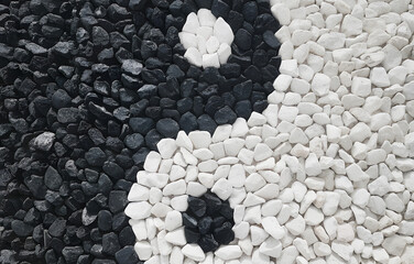 in Yang Symbol Made of Black and White Pebbles Abstract Stone Art Background