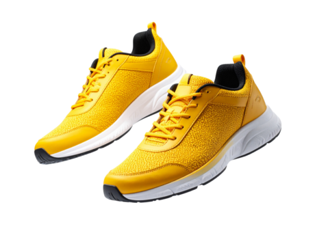 Yellow Running Shoes Floating in the Air on White Background