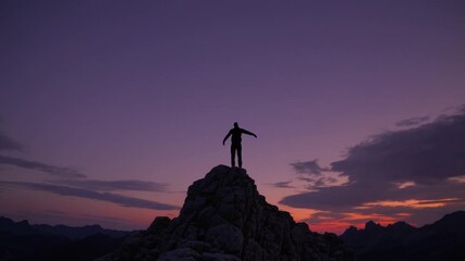 AweInspiring Sunset Peak Moment Majestic Person Embracing the Great Outdoors, Ideal for Empowering Campaigns and Tranquil Projects.