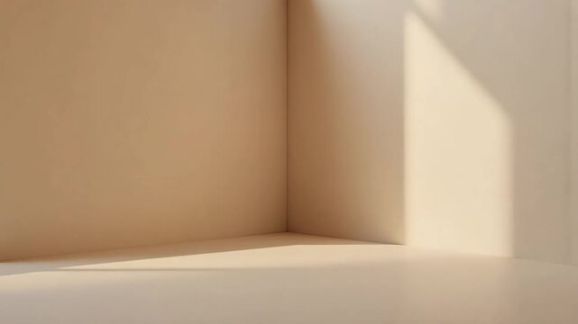 Interior corner with soft lighting casting shadows on the light beige walls and baseboard area