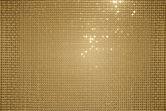 Fototapeta Golden texture shimmers with luxurious reflections, creating an opulent and eye-catching background ideal for festive designs.