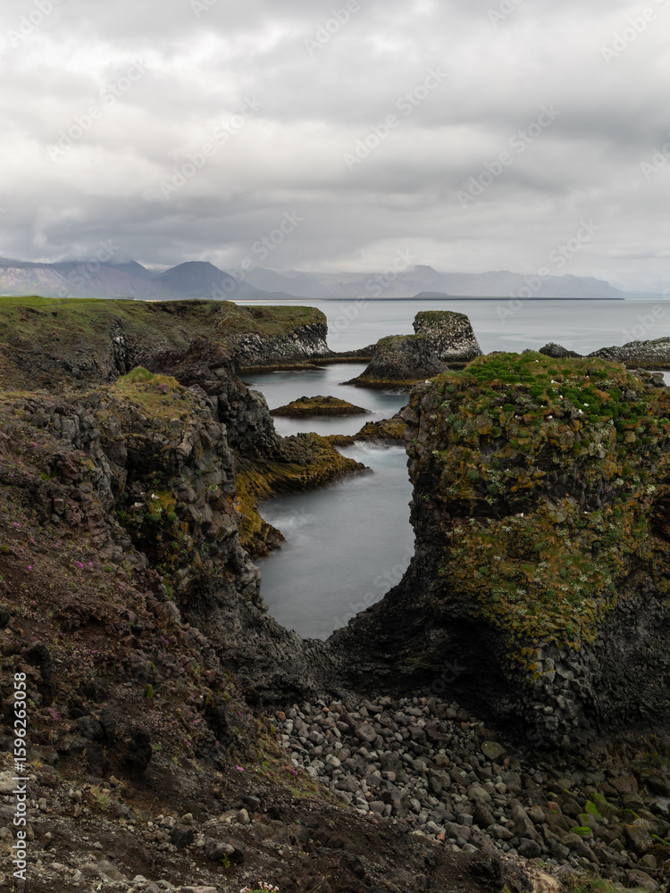 Canvas Prints scenic view of arnarstapi coastline on a cloudy day, iceland.