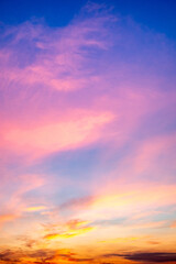 Beautiful , luxury soft gradient orange gold clouds and sunlight on the blue sky perfect for the background, take in evening,Twilight, Large size, high definition landscape photo,Vertical