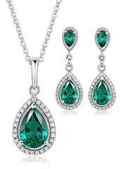 Elegant jewelry set featuring a silver chain necklace and matching emerald teardrop earrings