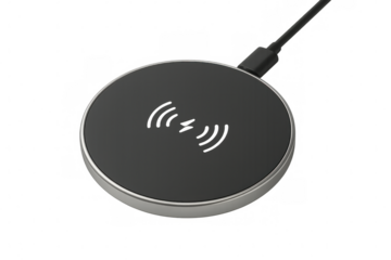 Black wireless charging pad with silver rim and connected usb cable, isolated on transparent background, ready for charging