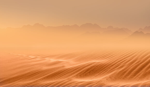 Panoramic view of orange sand dune desert with orange mountains and hill - Namib desert, Namibia