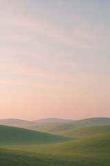 Rolling green hills at dawn with pastel sky